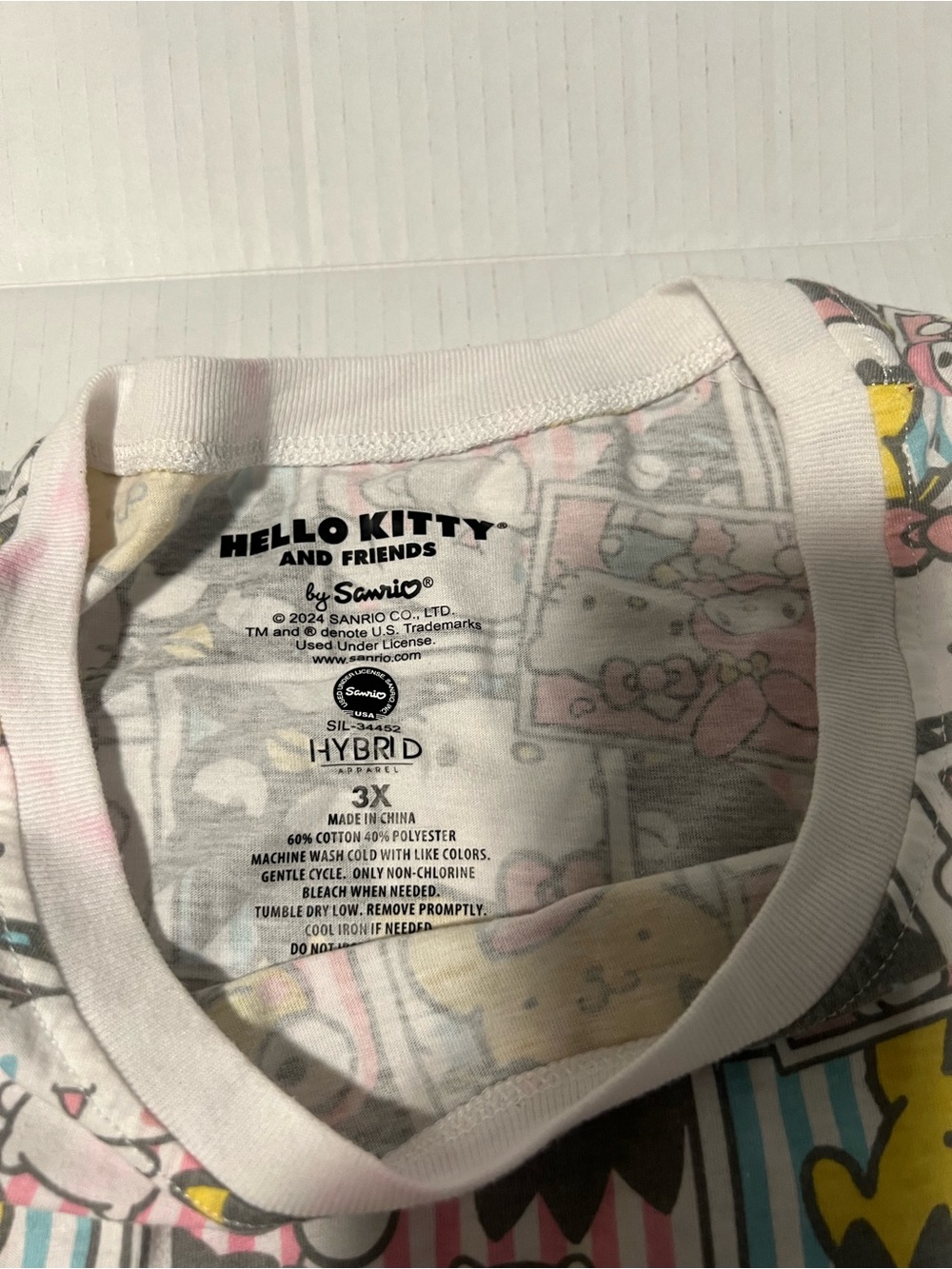 Sanrio Hello Kitty & Friends All-Over Print Tee in White, Pink, Yellow - Picture 2 of 2
